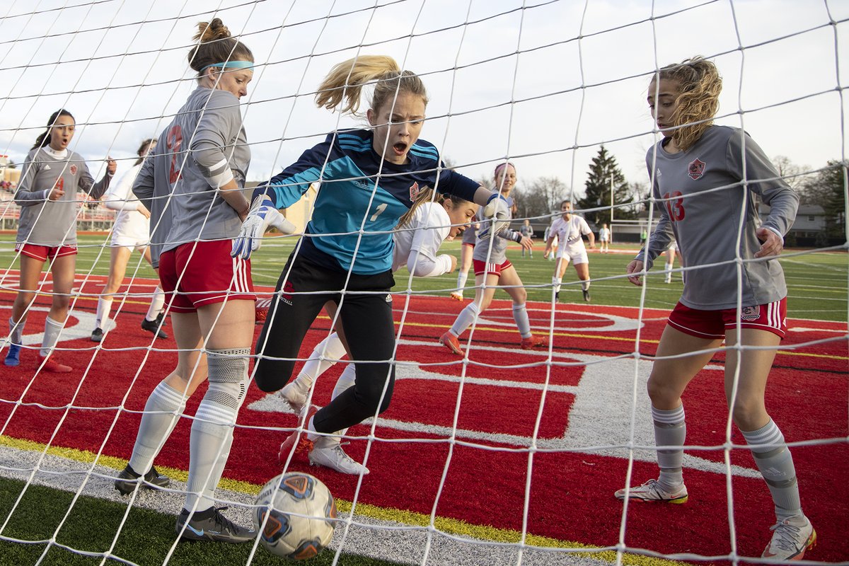 Sometimes you can sum up an entire game with a few photos that show all the emotions of a hard fought game against two good teams. Marian defeated Divine Child 1-0 with a late game corner kick scored by Angelina Briggs.