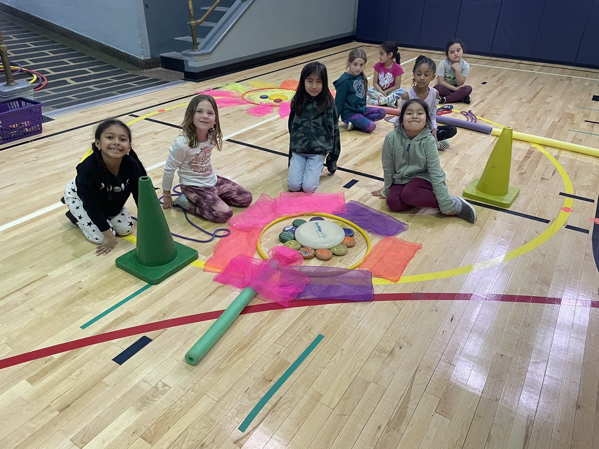 brookavePE's tweet photo. Today in PE at @BrookAveSchool we discussed cooperation! We listened to a story about students working together on a project. Then we shared and listened to each others ideas to “build a flower” with PE equipment! https://t.co/vN7A9MyTtD