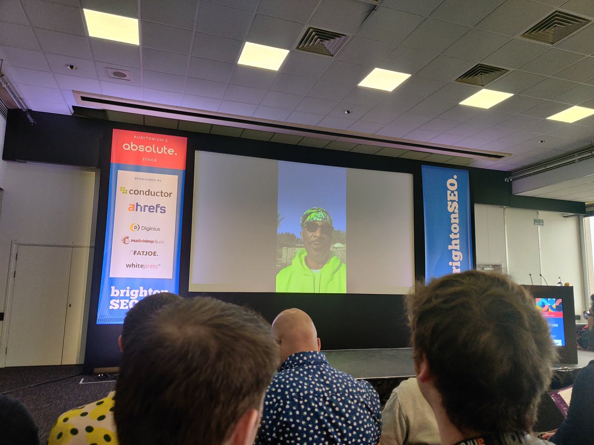 AdamJamesMason's tweet photo. Things always go full circle. Like my childhood Mr Motivator is back on the screen first thing to kick things off #BrightonSEO https://t.co/0QZ6vhRyCL