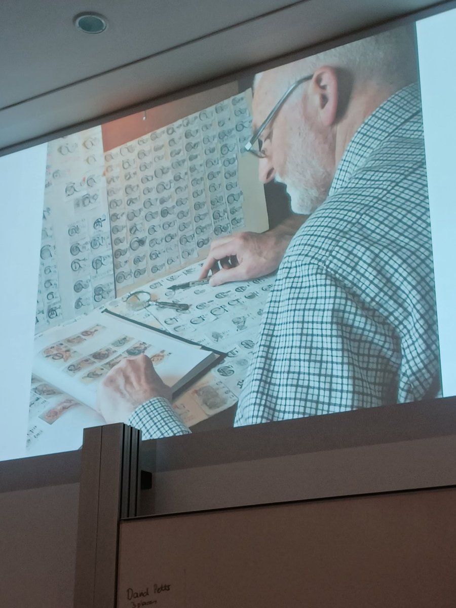 weefiddler's tweet photo. Donncha MacGabhann at work with his catalogue of Kells initials. #IIAC9 https://t.co/RXGrjANhUH