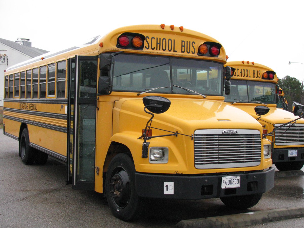 oectagovernor's tweet photo. To slow COVID transmission, masks must be worn on the bus to the left, but not on the bus to the right. 

Ontario in 2022. https://t.co/FeIrSJA3h6
