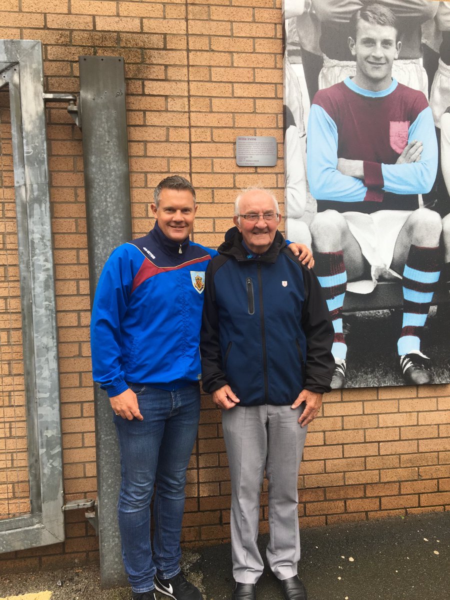 ⁦<a href="/AlanPaceBFC/">Alan Pace</a>⁩ Here’s a picture of my dad &amp; me in 2019. And, coincidentally, the man in the picture on the wall is my dad. What has happened to these magnificent pictures of some of the heroes of Burnley’s incredible history? If you don’t want them, I could find a home.