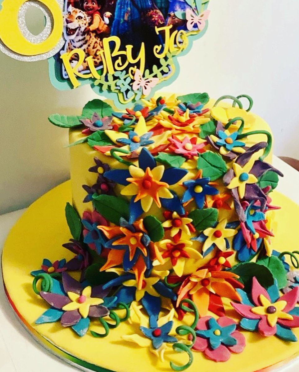 Brooksmeisters's tweet photo. Loved doing this one - and love the end result it’s so vibrant and cheerful. Done for a little girls 8th birthday who loves Encanto #potsandflours #custommadecake #bespokebake #encantocake #occasioncake https://t.co/D7Nwwra2UC