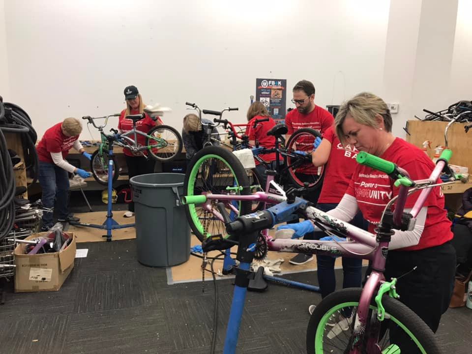 WIS_DFI's tweet photo. Thank you, @wisbank, @CapitolBank &amp; @FB4KMadison, for inviting @WIS_DFI Secretary-designee Cheryll Olson-Collins to volunteer at today's #PowerofCommunityWeek event! She had a great time refurbishing bikes for kids in Dane County &amp; keeping old bikes out of landfills on #EarthDay! https://t.co/IwDQVcnXVA