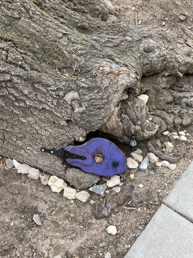 EnserroNathan's tweet photo. Someone built a front door for a campus squirrel. I love #KState so much. https://t.co/82DMV0f6xN