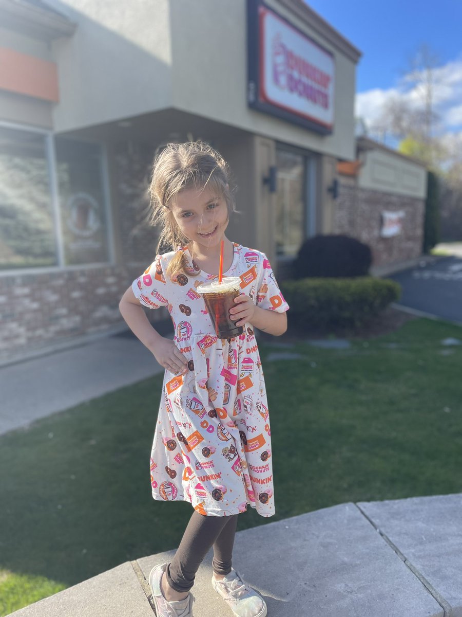 When your mini me loves <a href="/dunkindonuts/">Dunkin'</a> as much as you do. #icedcoffee #donut #peepthedress #raeoflightboutique
