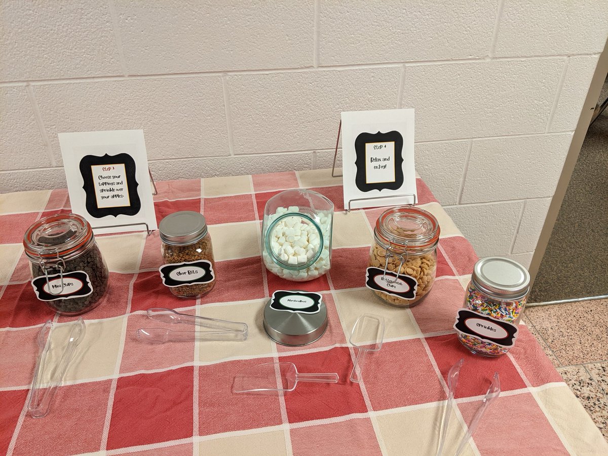 MissKrawesky's tweet photo. When your @stpatcatholic principal sets up an apple nacho bar in the hallway during a PD day. I put caramel sauce, mini M&amp;M's, pretzel bits, chocolate chips and Skor pieces on mine. #SoGratefulForYouMrsBecks! https://t.co/mVbzMr8FG1