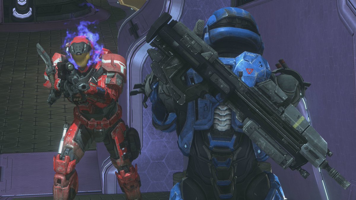 A red and blue Spartan from Halo: Reach face-off against each other.