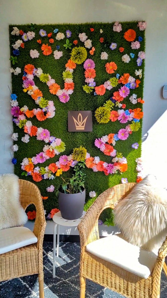 Come take a photo in front of our King Street flower wall 🌸🌺🌼 #420day #yeg
