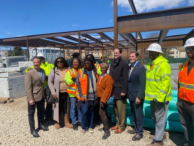 SenBlumenthal's tweet photo. Exciting to see the final phase of construction begin on the Honey Locust Square development in Bridgeport’s East End &amp; sign one of the building support beams. This new grocery story &amp; retail plaza will help drive economic growth &amp; expand local shopping options. https://t.co/pUzS4vsVxj