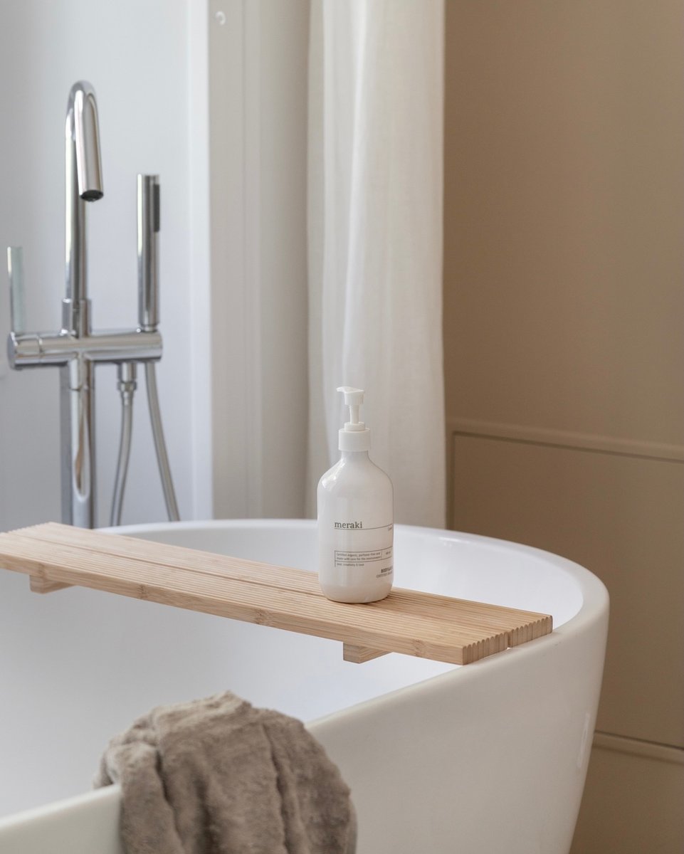 It’s often difficult to photograph a bathroom in their entirety. They are often small spaces with little light.

 My tips for beautiful bathroom photos are:

 - put your camera on a tripod to use a slow shutter speed
 - set your camera to the A position, the best shutter speed