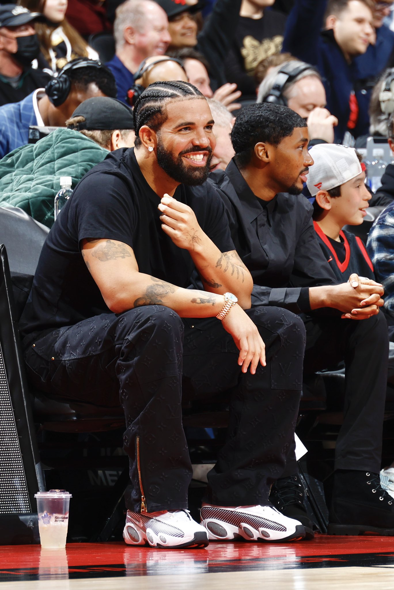 Nick DePaula on Twitter: "Drake is back courtside in a white pair of  Whatever This New Zoom Flight 95-esque Shoe is tonight:  https://t.co/TW7AIFG8Bd" / Twitter