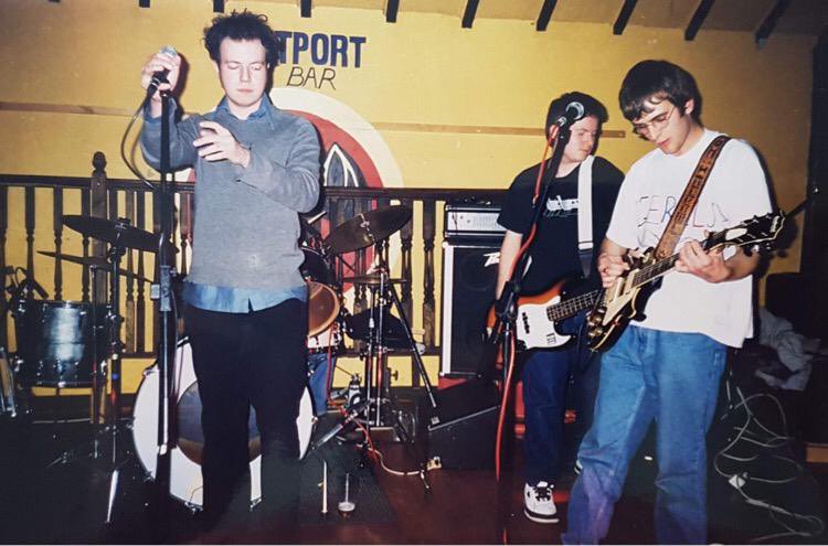 peepsintofairy1's tweet photo. For #ThrowbackThursday here is a recently unearthed photo of Peeps playing at the Westport Bar in Dundee February 1999 @PaulHerbert8 is sporting his homemade Gerils t-shirt! #peepsintofairyland #gerils #westportbar #dundee @MR10B8 #gig #scottishband #livemusic #indie #indiemusic https://t.co/RsdKlik8w4
