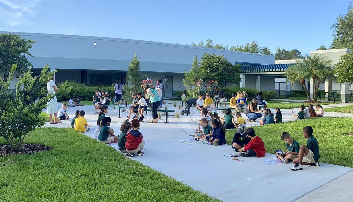 Students in 1st and Kindergarten Dual classes practice their bilingual reading skills buddy reading with each other.  <a href="/HillsboroughSch/">Hillsborough Schools</a> <a href="/DuallangHcps/">Dual Language HCPS</a>