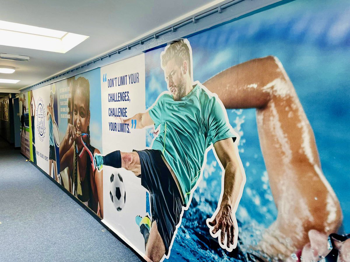 NEDisplay's tweet photo. Today we transformed a walk way within Valley Gardens Middle School. This 16m wall dedicated to sports was designed produced and installed by the NE Display team. ⭐️ https://t.co/Kk64ztyiQu
