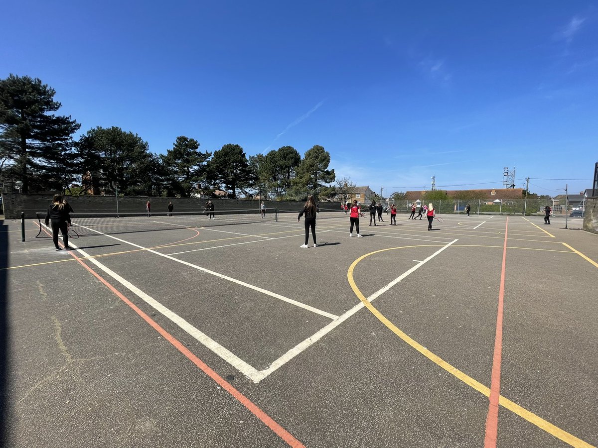 Smithdon_High's tweet photo. Summer term means summer sports - Mr Pack and Mr Tilley leading our Year 9’s in a Tennis lesson 🎾 #outsidepelesson #summersport #serve #deuce #sunishere ☀️ https://t.co/aI5udBix71