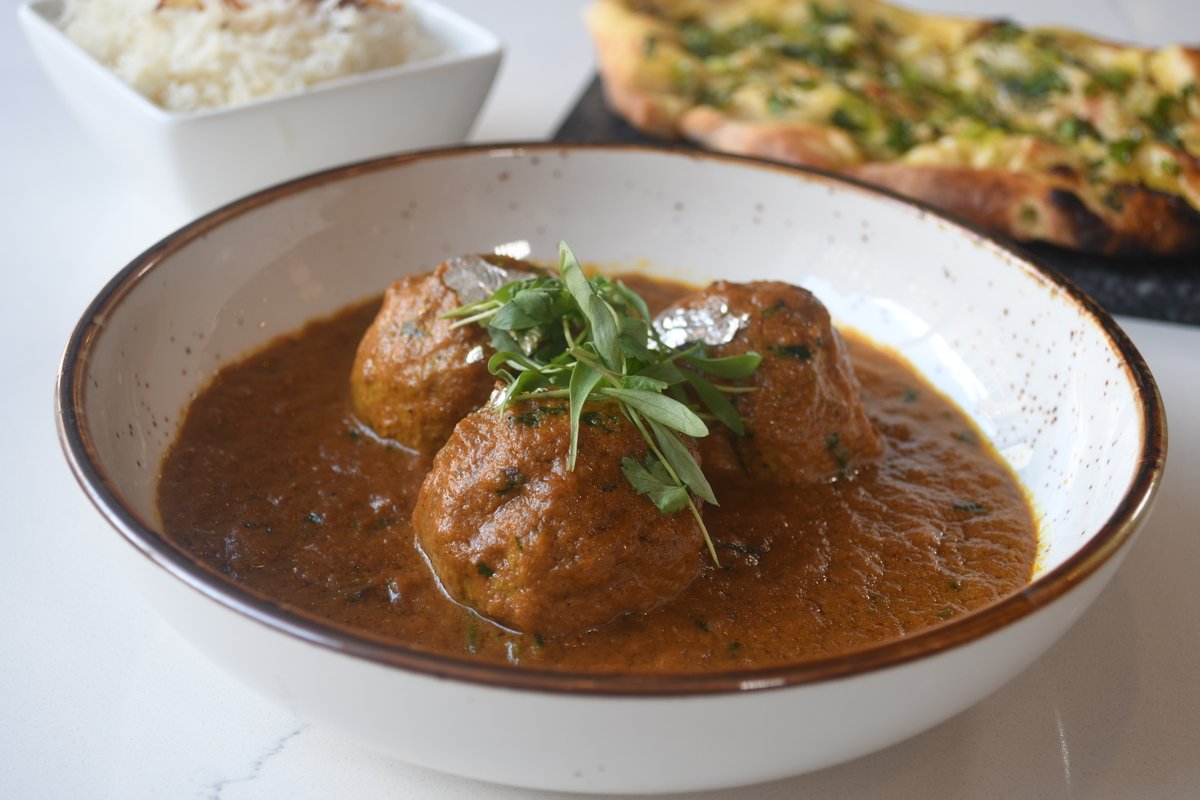 Kashmiri Chicken Gushtaba is one of the entree items from Chef Ajay found on our new spring menu. A classic dish with minced chicken balls served in a spicy gravy. It's so good you'll definitely be wanting more.