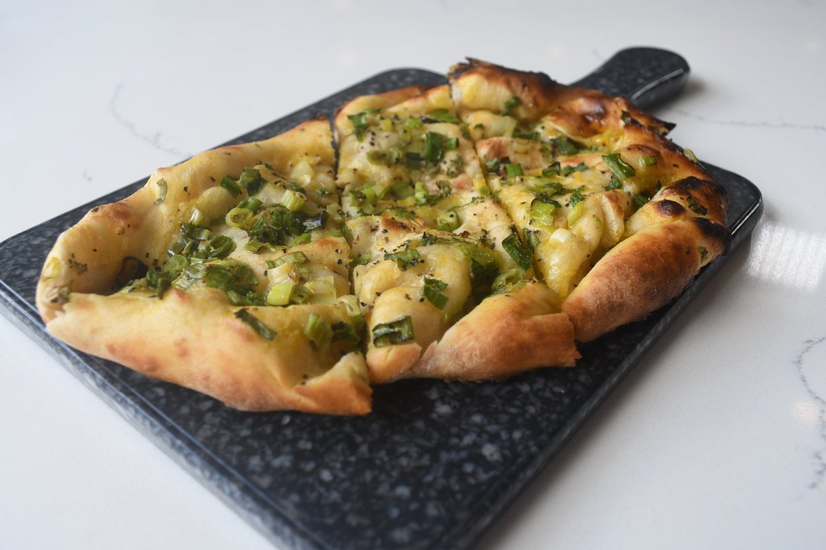 The breads are heavenly at Kismet Modern Indian which is why we've titled the naan section of our menu "Heavenly Breads". You can choose from a selection of naans including the Garden Naan topped with fresh scallions and brushed with a light mustard seed oil.