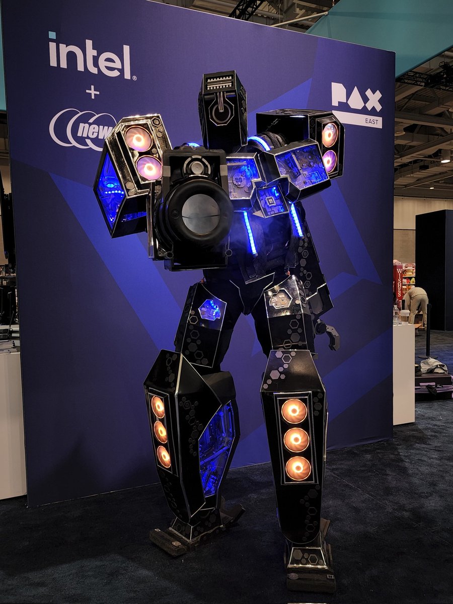 Newegg's tweet photo. The #CoreBot at the @IntelGaming is a must see at #PAXEast. Come take a picture. Just don't make him angry #intel #PAXEast2022 #newegg #robot #gamingpc #cosplay @ExtremeCostumes https://t.co/FpcvcOxDlJ