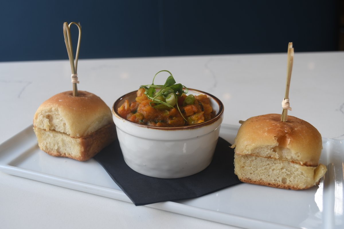 Chef Ajay is known for combining traditional Indian cooking with unique ingredients and western influences - like the Mumbai Sliders - a vegetarian appetizer with potatoes and vegetables served slider style alongside house-made Pav, an Indian bread roll.