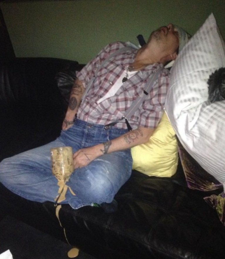 JohnnyasR's tweet photo. Amber Heard took this picture of Johnny Depp asleep on the sofa with spilt ice cream to use in court to humiliate him. Notice one hand in his pocket. Staged. He fell asleep AFTER working for 17 hours! Sick!
#JusticeForJohnnyDepp 
#JohnnyDeppIsInnocent https://t.co/t5wag2QdiL