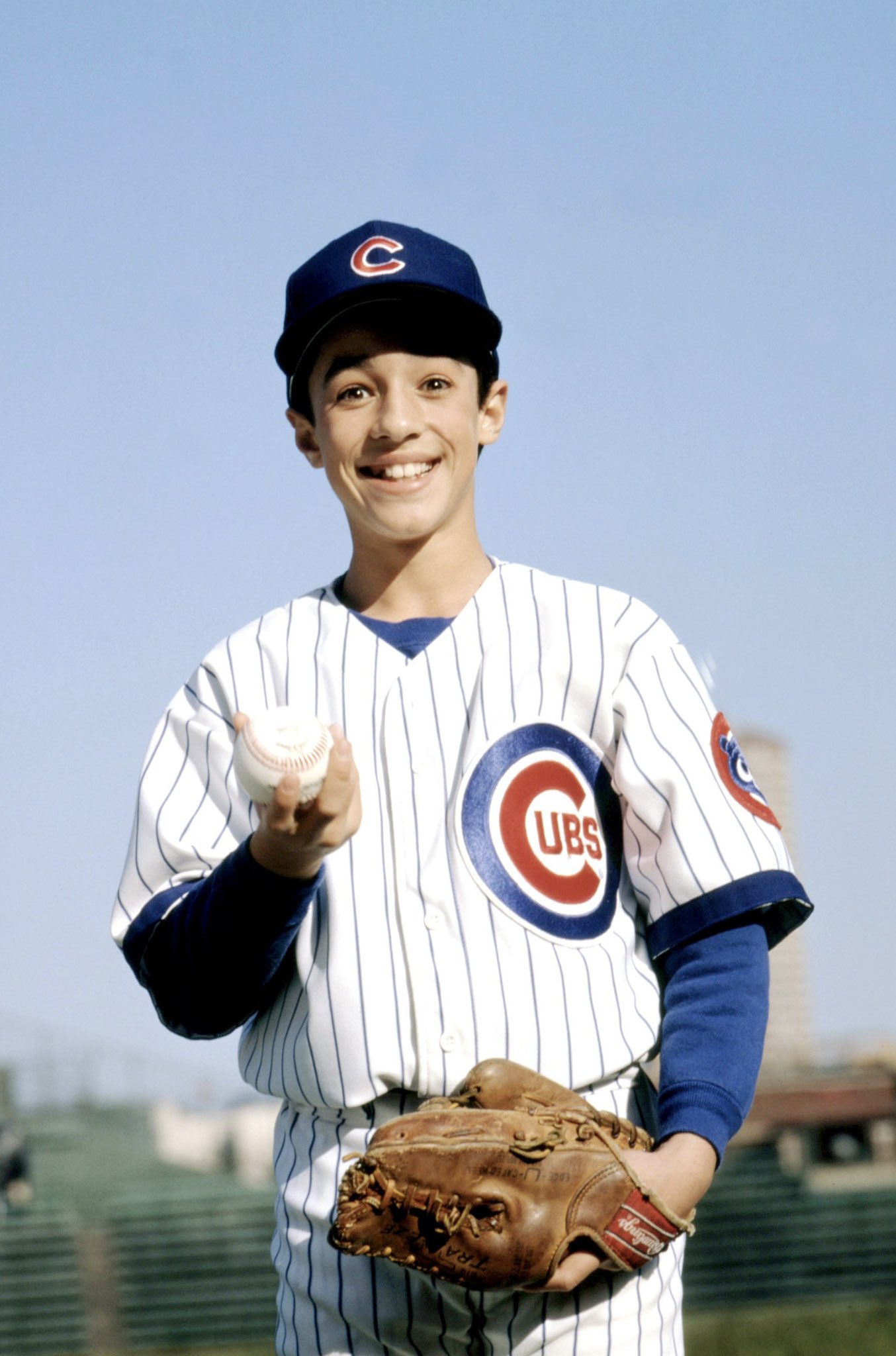 Henry Rowengartner, an actor from the film Rookie of the Year, prepares  to throw out a ceremonial first pitch before a baseball game between the  St. Louis Cardinals and the Chicago Cubs