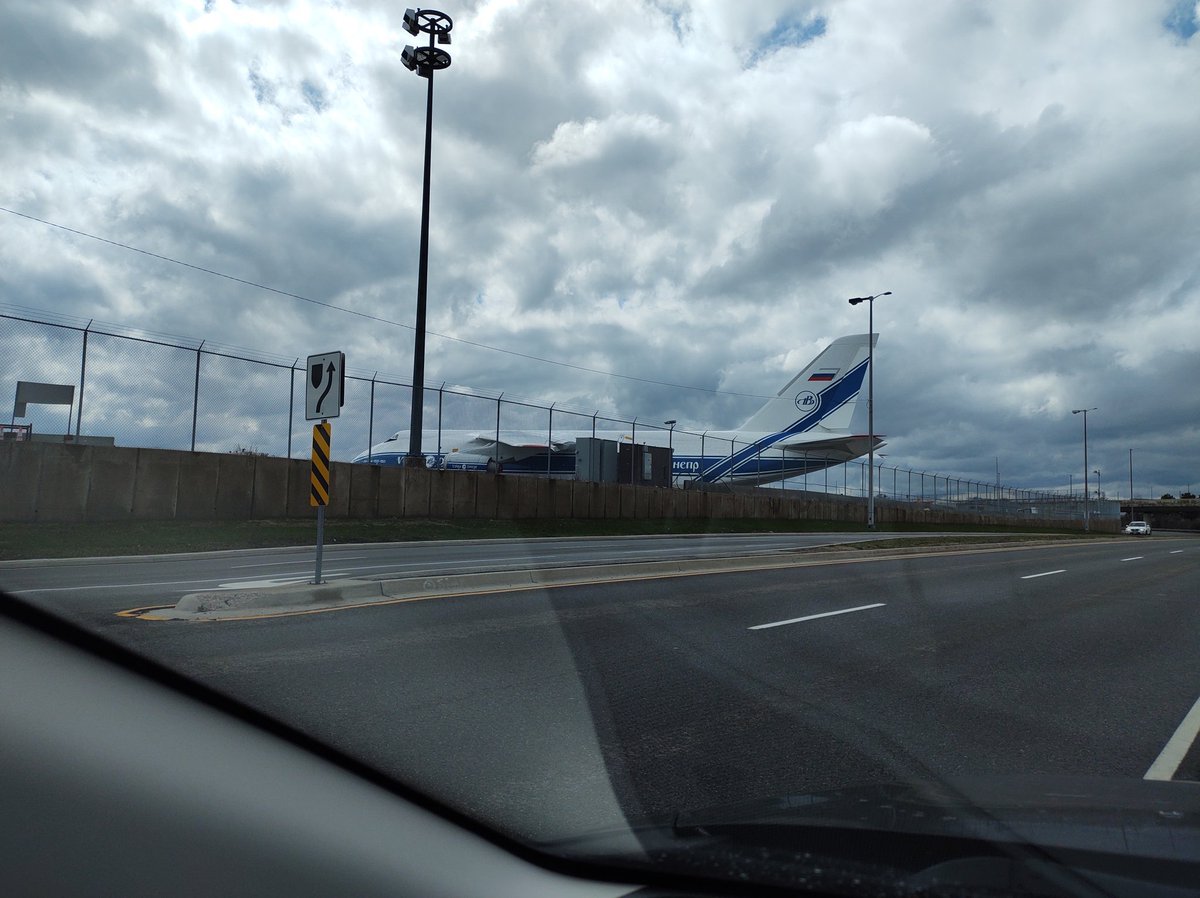 TurboFEM's tweet photo. Stuck An-124 Ruslan (Volga-Dnepr airlines #VI5854 RA-82078) at Pearson Intn'l Toronto, moments ago.
Can't leave as Canadian airspace closed for Russian registered aircraft, as the jet was stopping by for fuel.
The thing is really gigantic in person. https://t.co/zJupGZ07Z3