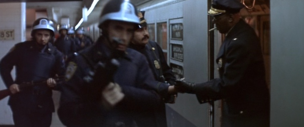 The Taking of Pelham One Two Three (1974) is a perfect comedy-thriller about a New York Transit Police captain negotiating with professional criminals who have taken a subway car hostage and demanded a $1 million ransom. Not a single wasted moment.