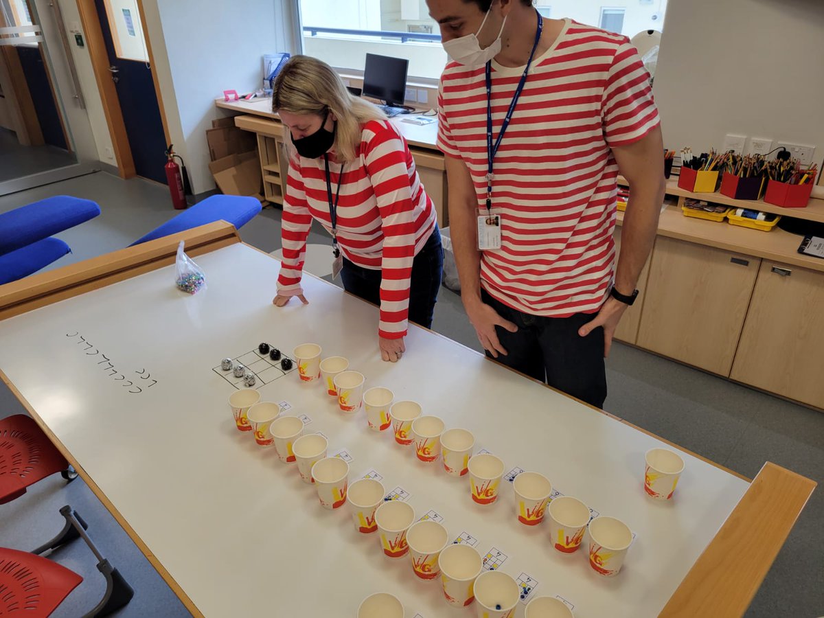 Inspired by <a href="/VsauceTwo/">Vsauce2</a> we knocked up a quick #hexapawn computer out of cups and beads. After 10 or so games it could beat us 100% of the time. Look forward to letting the kids try their hands against it! (and yes it was Where's Wally day in our room today) #MachineLearning #ai