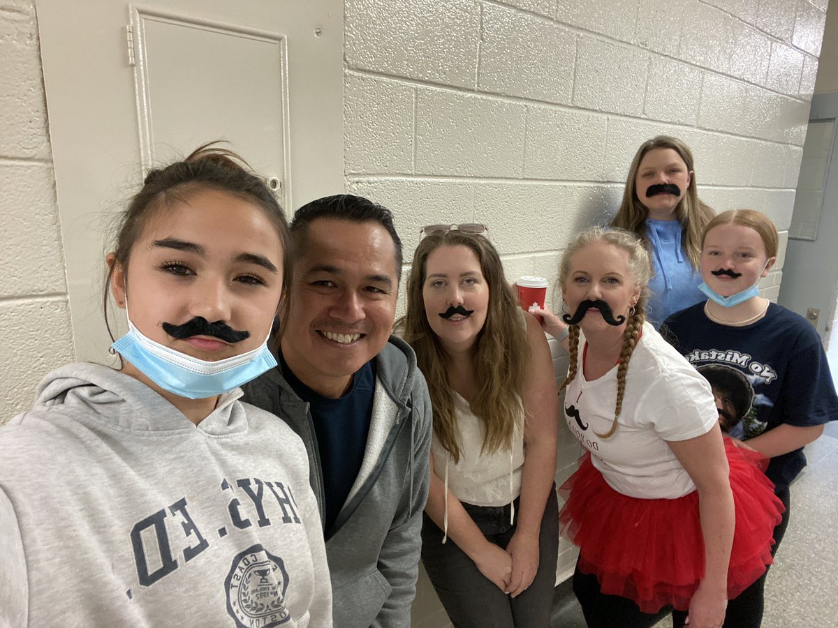 MrsHoltEES's tweet photo. Happy Moustache Day! #holt2122 #qebspirit #moustacheday #yesimwearingatutu #groupshot @HPEDSB_QEB https://t.co/XGgXDSfVaV