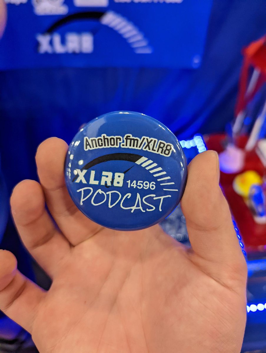 We have two more podcast buttons and they have a cool little surprise on the back, signed by the hosts of the podcast!