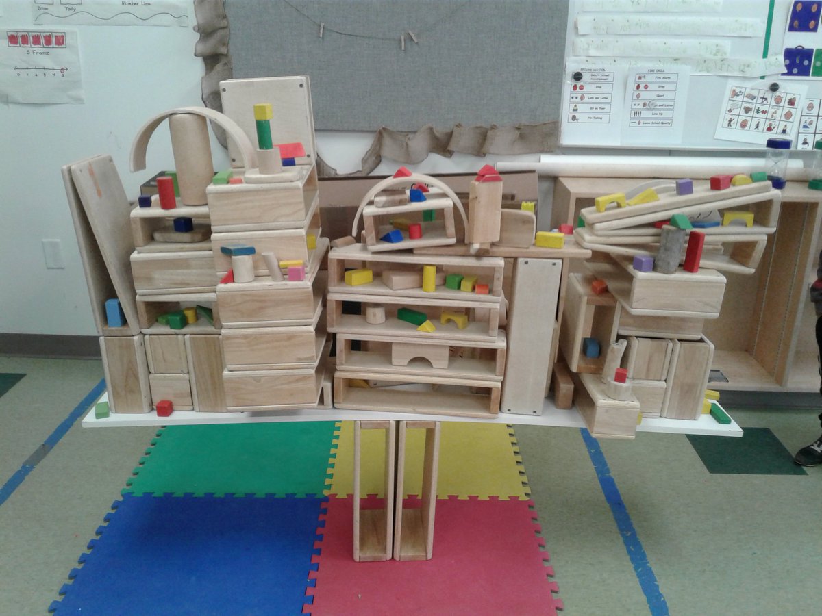 Talk about a balancing act! This only took the team of 3 students a couple of tries before they caught on to what needed to be done TOGETHER!