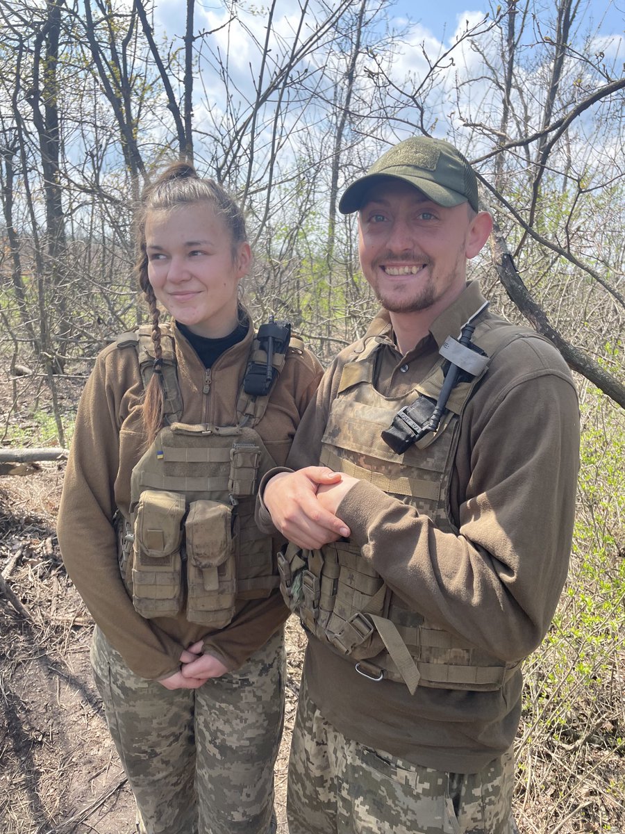 Senior Lieutenant Olena Petyak and Sergeant Oleksandr Gorvat of the 128th Brigade are due to be married after the war. He proposed with a ring of twisted wire a day after Russian forces invaded. Seen here about two miles from the Russian lines not reacting to artillery fire.