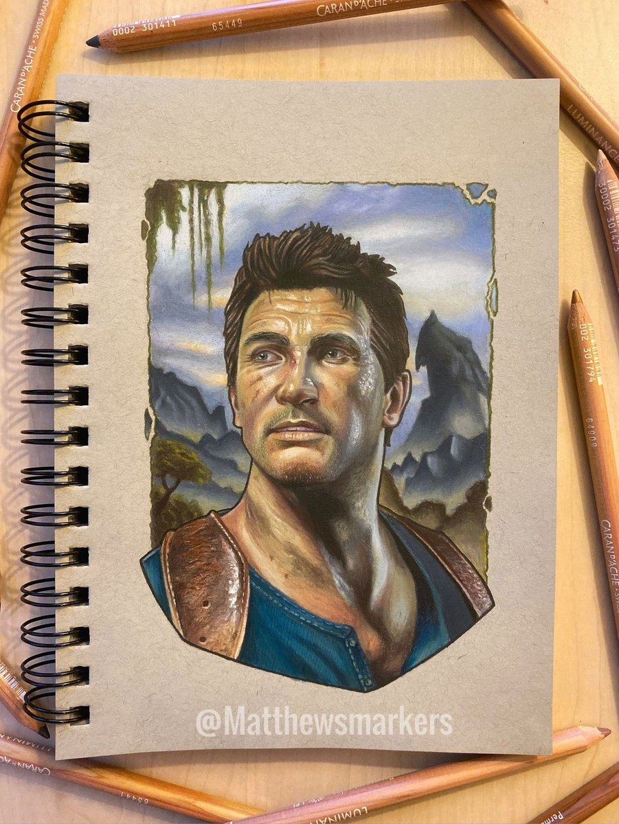 A color portrait of Nathan Drake from UNCHARTED. He had brown hair, tan skin, and is wearing a navy blue shirt with leather straps over his shoulder. A mountainous jungle is in the background.