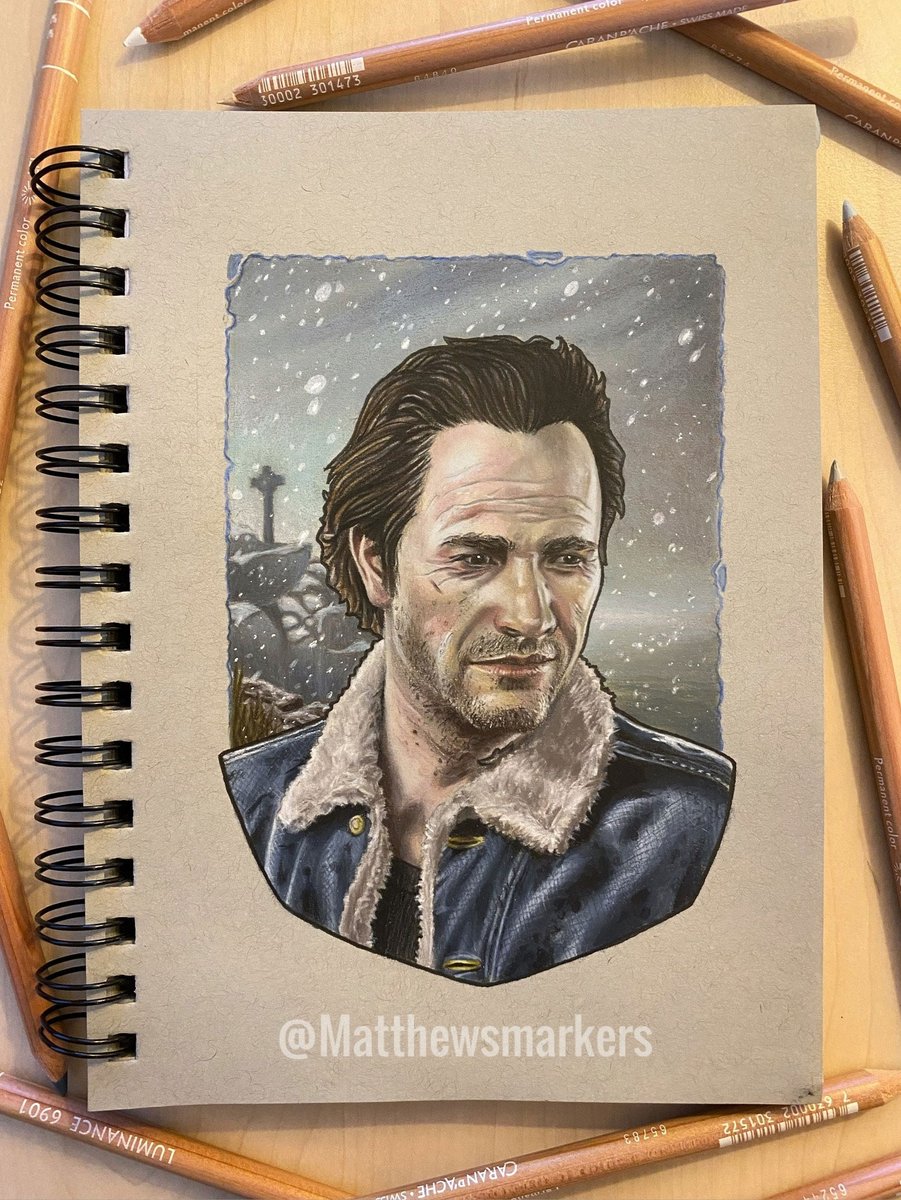 A color portrait of Sam Drake from UNCHARTED. He had brown hair, pale skin, and is wearing a denim jacket with fleece on the collar. A snowy, desolate landscape is in the background.