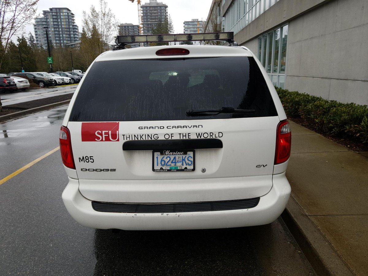 This humble Dodge Caravan, number M85, is a messenger from the past -- here to remind us that before popping the question and getting engaged with the world, SFU thought about it for a couple of years. Ah, youth! #SFU