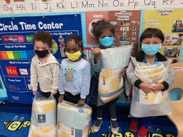 A big thank you to Lemon Stripes and <a href="/ChappyWrap/">ChappyWrap</a> for your generous donation of over 700 blankets! Kids in our Weekend Meal Program are comfy, cozy and all smiles!