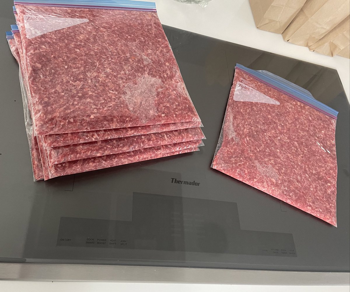 Does everyone stack their ground beef like this for the freezer or are you all just throwing in clumps of meat that take all day to thaw? #foodhack