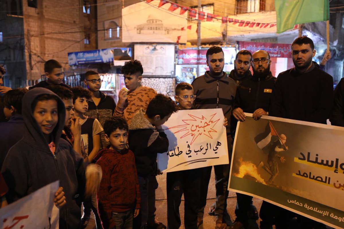 QudsNen's tweet photo. Photos | Palestinian in Gaza city took part in a vigil in protest of the ongoing Israeli crackdown on #Jenin camp, this evening.
#FreePalestine https://t.co/0ivVcmBJcW