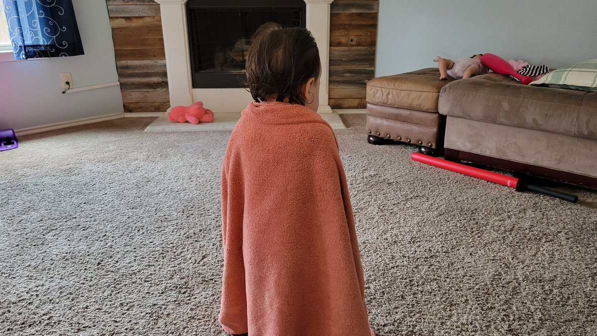 She's staring at the red foam sword in the ground, as if she is thinking, "Shall I fall to the dark side? Shall I dispose of the morals, &amp; beliefs I have upheld all these years?...I cannot deny the call the shadows have whispered in my ears...pulling me towards my darker self."