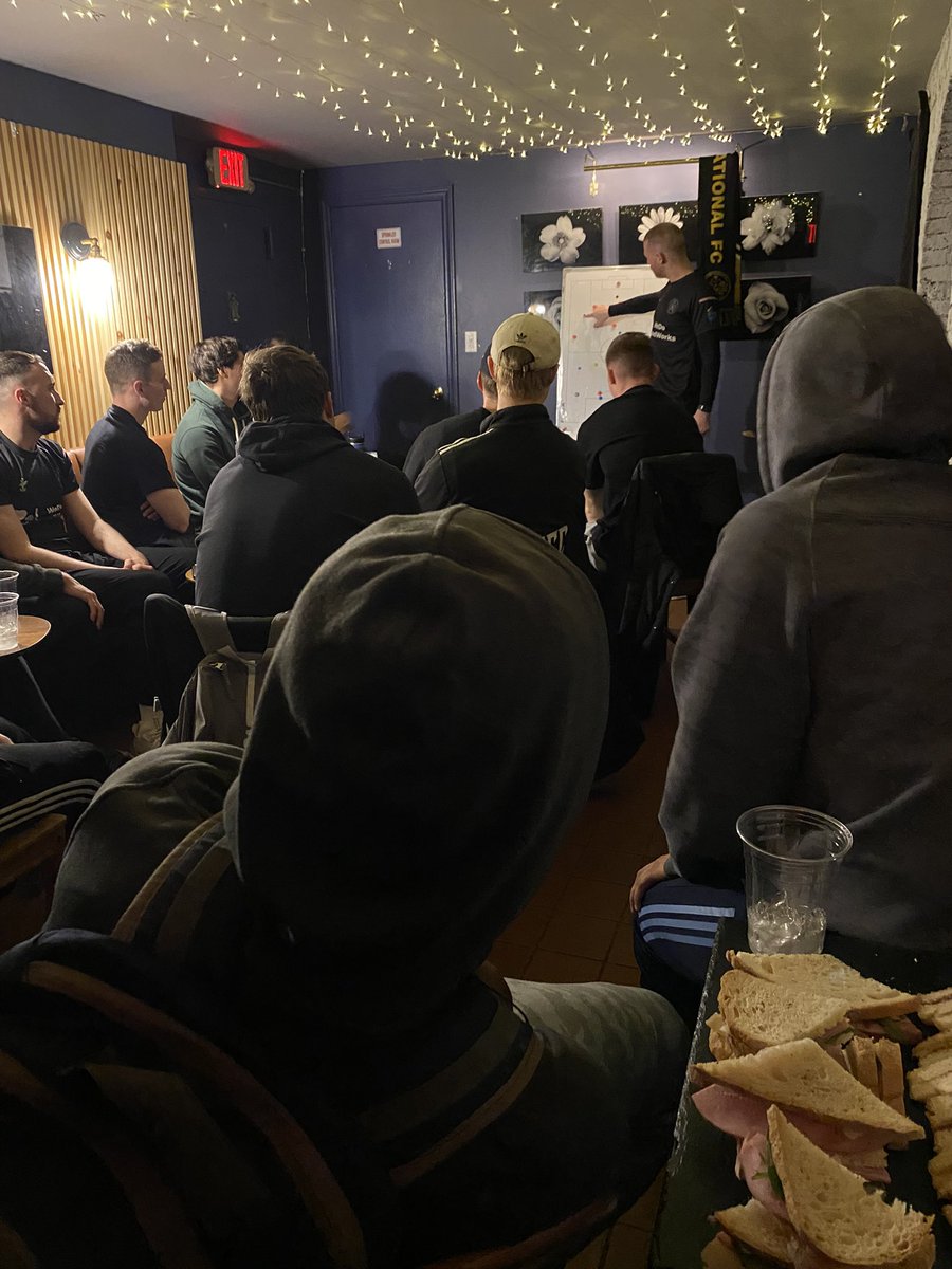 NYIntFC's tweet photo. Match tactics with the Gaffa before the @CosmoLeague Kilby Cup final this evening.
Massive thanks to our hosts and sponsors @StellaFly5 for the pre-match food.
#nyisblackandgold #bringthetrophyhome #winfordavide https://t.co/VltmIq6uL9