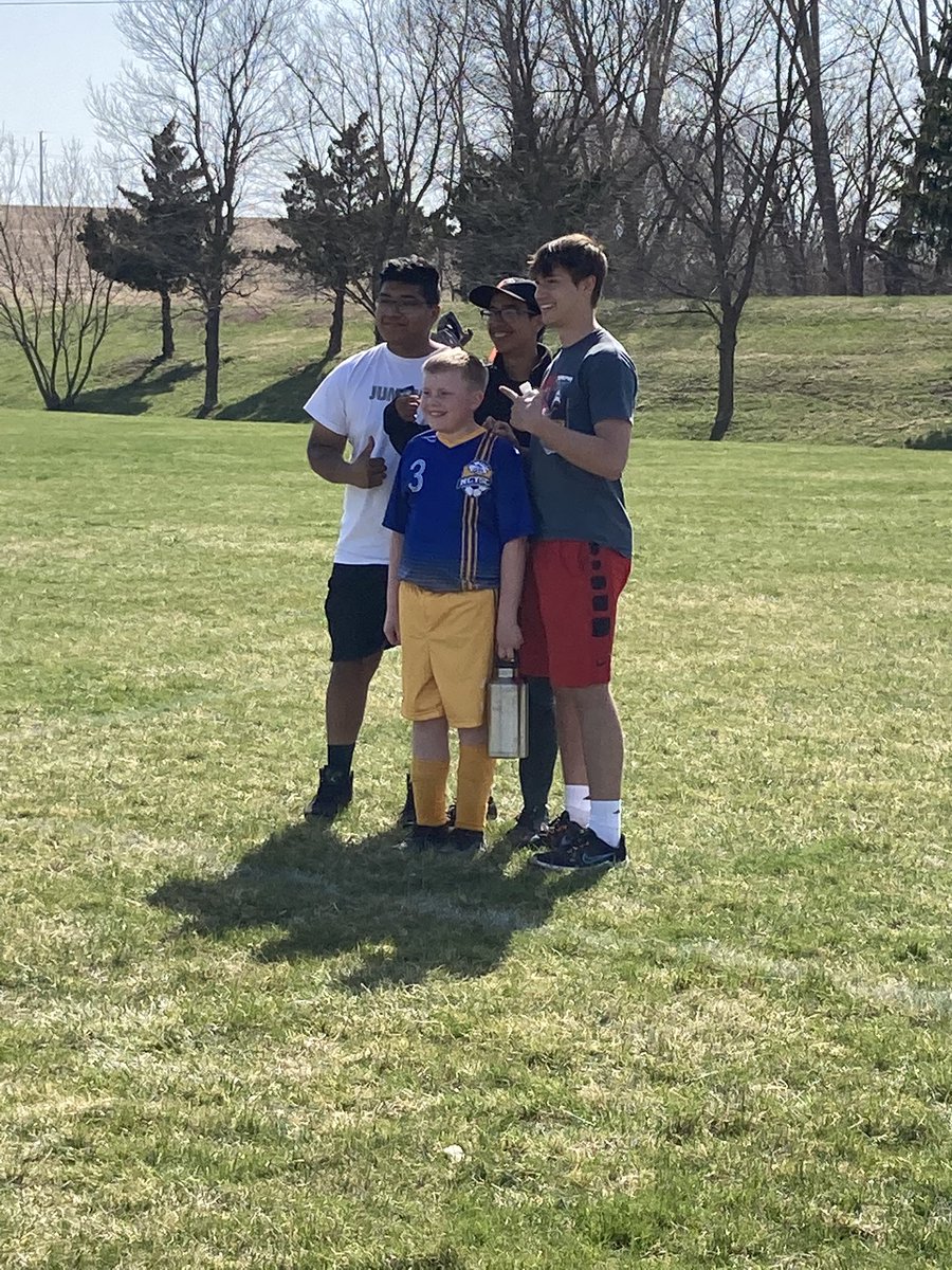 NebcityBoyssoc's tweet photo. On the field is one thing, off the field is another! NC boys showing some love to Lucas and our youth soccer players today! 💛⚽️💜 https://t.co/eTdisqHaBh