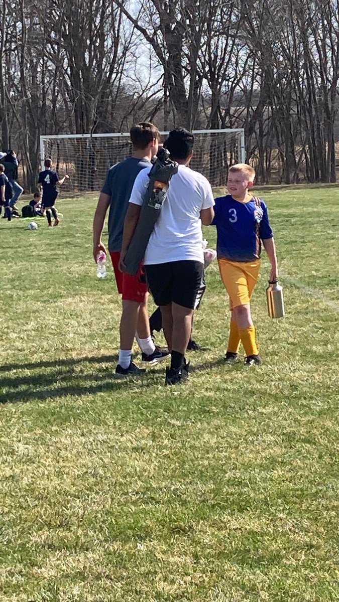 NebcityBoyssoc's tweet photo. On the field is one thing, off the field is another! NC boys showing some love to Lucas and our youth soccer players today! 💛⚽️💜 https://t.co/eTdisqHaBh