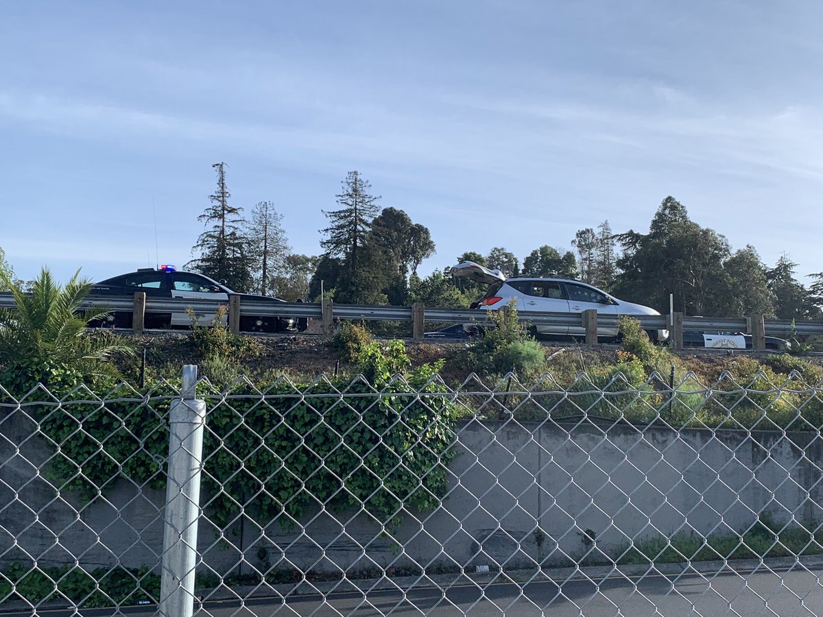 ZakSNews's tweet image. Car riddled with bullets on I-580 around 3:49pm. CHP on scene investigating. Witness tells us he heard what sounded like spray of around 20 bullets. Westbound traffic shutdown, being diverted off at MacArthur Blvd. No word on any injuries. @KTVU