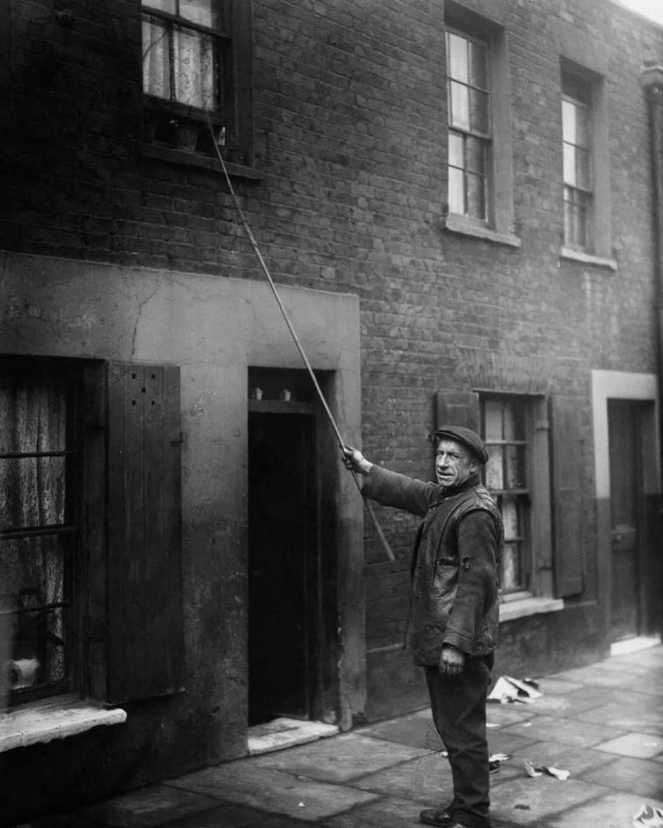 Tremendous photo of a “knocker up”. A knocker up was someone who was paid to wake others up in time for work, before the time of the alarm clock! Is there anyone you know who could still use this service today? 😁 gwynfiheritage.com #treftadaeth #heritage #gwynfi