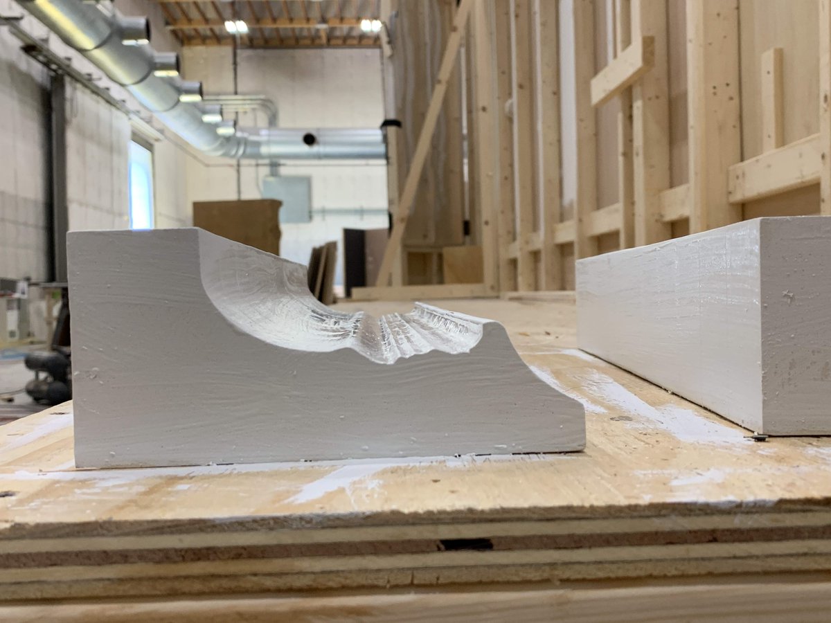 Instead, John Paratore (owner of Paratore Signs) came up with the genius idea to cut out a bunch of “profile” cuts of the molding pattern from 1”-thick high-density urethane boards. Glue ‘em together in a row, sand, paint, and you’ve got your custom molding.