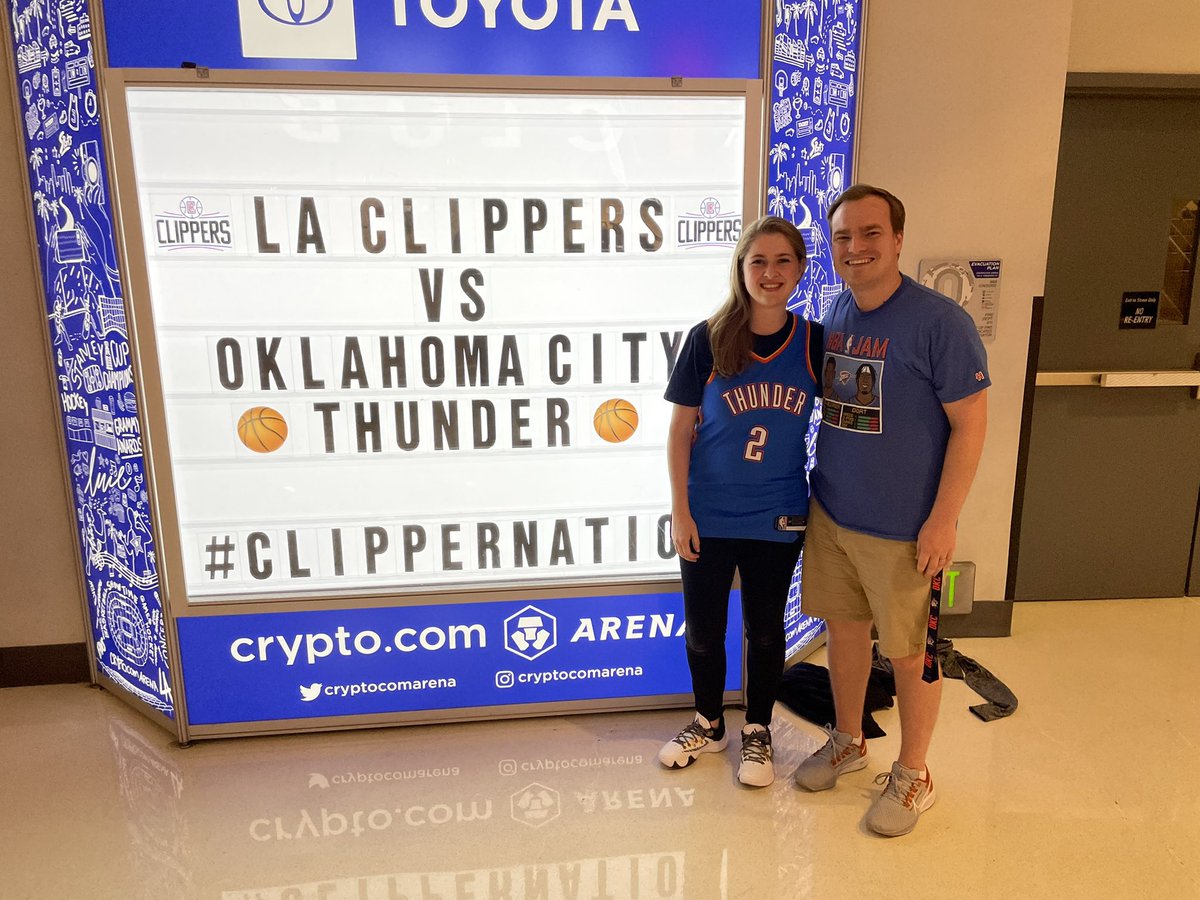 18anniee's tweet photo. Got blown out by 50… but we got a selfie with the Thunder legends @Exhoopsmc Michael Cage and Chris Fisher so it’s all good now. Fun way to end the NBA’s 75th season. #ThunderUp #okcatlac https://t.co/gfgrLL7qun
