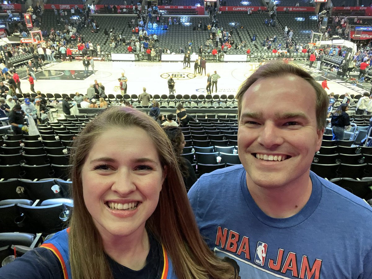 18anniee's tweet photo. Got blown out by 50… but we got a selfie with the Thunder legends @Exhoopsmc Michael Cage and Chris Fisher so it’s all good now. Fun way to end the NBA’s 75th season. #ThunderUp #okcatlac https://t.co/gfgrLL7qun
