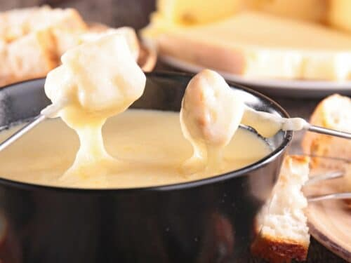 chef_rolin's tweet photo. Today is National Cheese Fondue Day. Fondue is a dish of melted cheese or other ingredients, served in a communal pot. People then dip the bread, meat, crackers, &amp; or vegetables into the cheese. Since cheese is such a delicious ingredient, this day recognizes a great food holiday https://t.co/w6bivVID5N