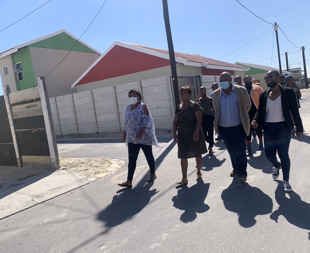 ewnreporter's tweet photo. #DelftElectricity Eskom officials and residents walk through the area of Eindhoven where Eskom connected 133 of the 181 homes in the area https://t.co/JbBYI5miPQ